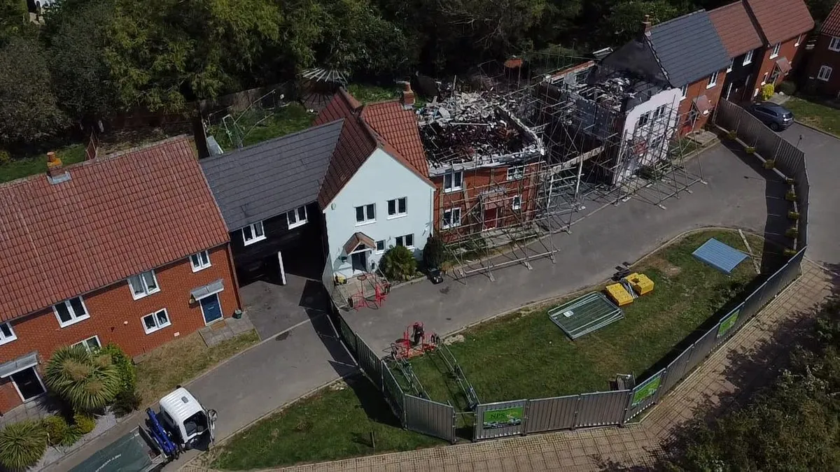 Aerial overview: scaffolding and welfare set-up at fire-damage reinstatement project