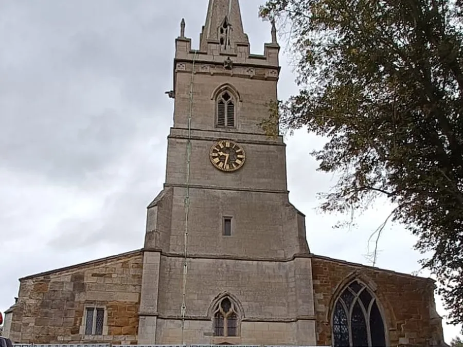 Church tower restoration with NPS site hoarding