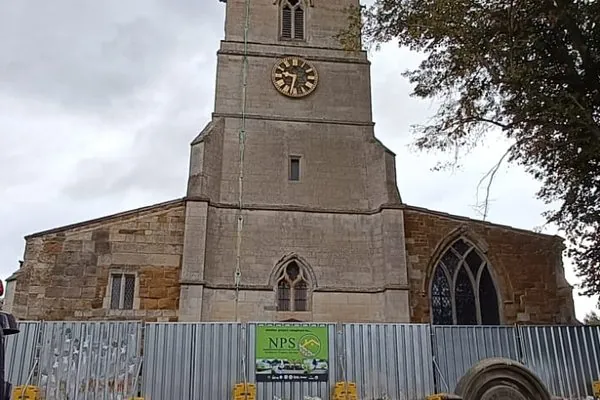 Church tower restoration with NPS site hoarding